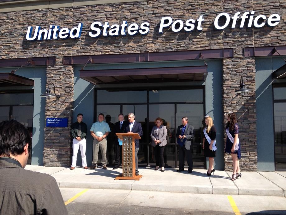Williston Post Office Opening-August 2014 - Senator Hoeven joins the Williston community at a ribbon cutting ceremony to mark the grand opening of the Badlands Postal Facility, the community’s new retail post office. Hoeven has been working with the Postmaster General as well as local and regional postal officials on an ongoing basis to improve service to the rapidly growing western part of the state.